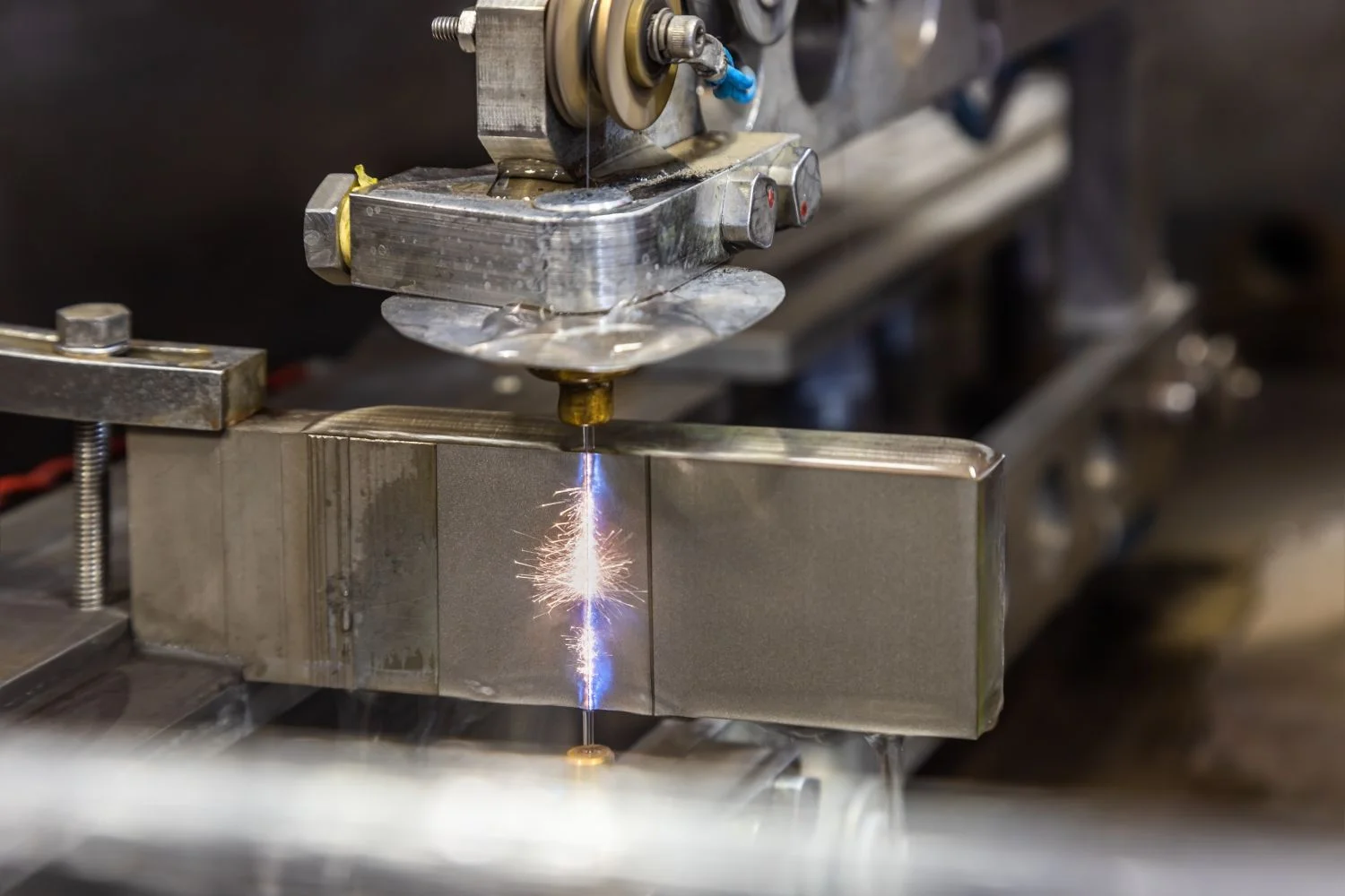 Wire-cut electrical discharge (WEDM) machines